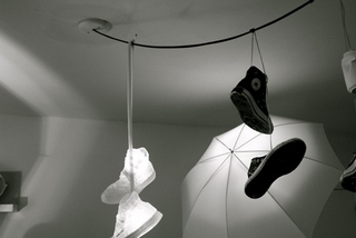 Illustration for article titled Shoe Chandelier Marks Your Suburban Gang Territory